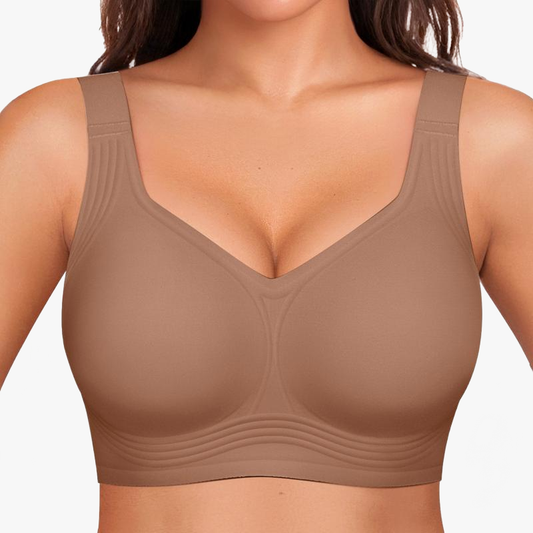 Close-up of a brown wirefree bra with wide straps, smooth cups, and layered underband.