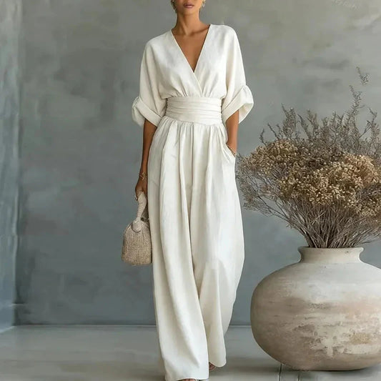 White chiffon wide-leg jumpsuit with V-neck, short sleeves and elastic waist