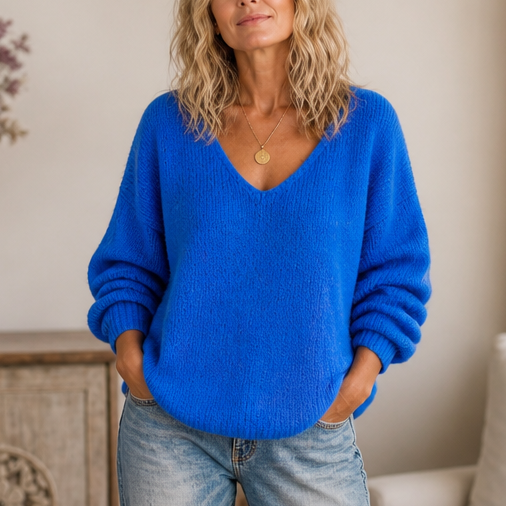 Blue chunky-knit V-neck sweater with long sleeves and ribbed cuffs