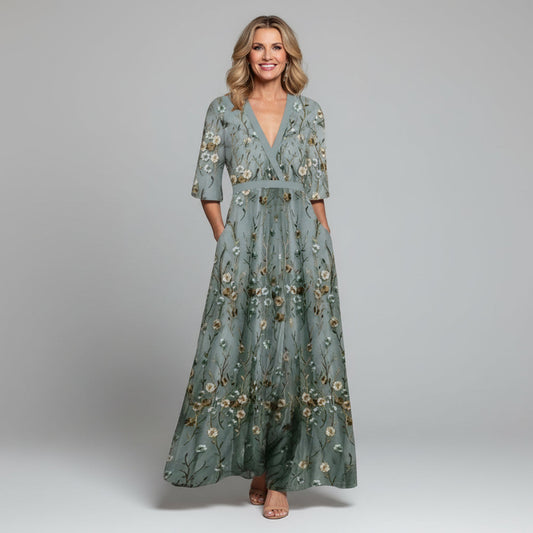Sage green floral maxi dress with V-neck, three-quarter sleeves, belted waist, flowing skirt