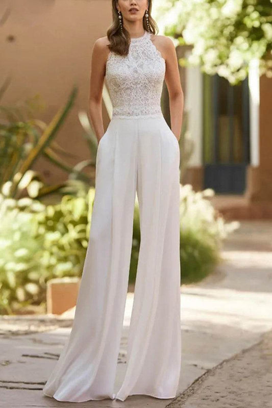 Ivory halter jumpsuit with lace bodice and flowy wide-leg pants, floor length