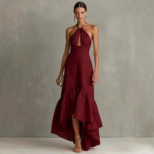 Burgundy halter maxi dress with keyhole cutout and tiered asymmetric hem