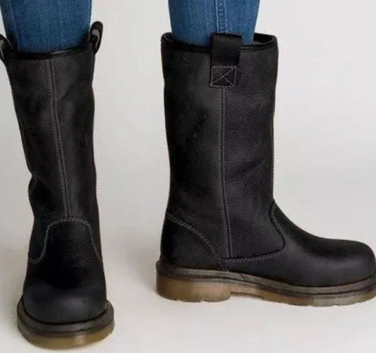 Black leather pull-on boots with square top tab and chunky rubber sole