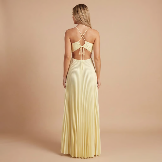 Light canary pleated halter maxi dress, racer-back cross straps and waist cutouts