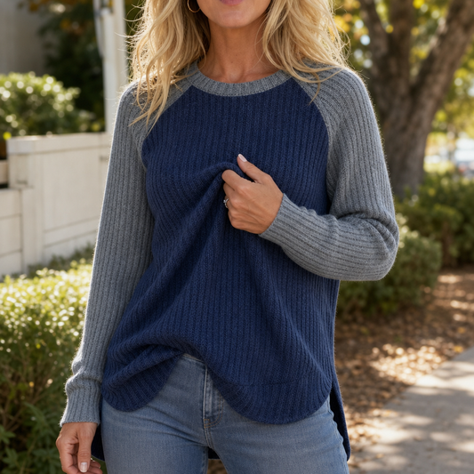 Navy-blue raglan waffle-knit top with light gray sleeves and crew neckline
