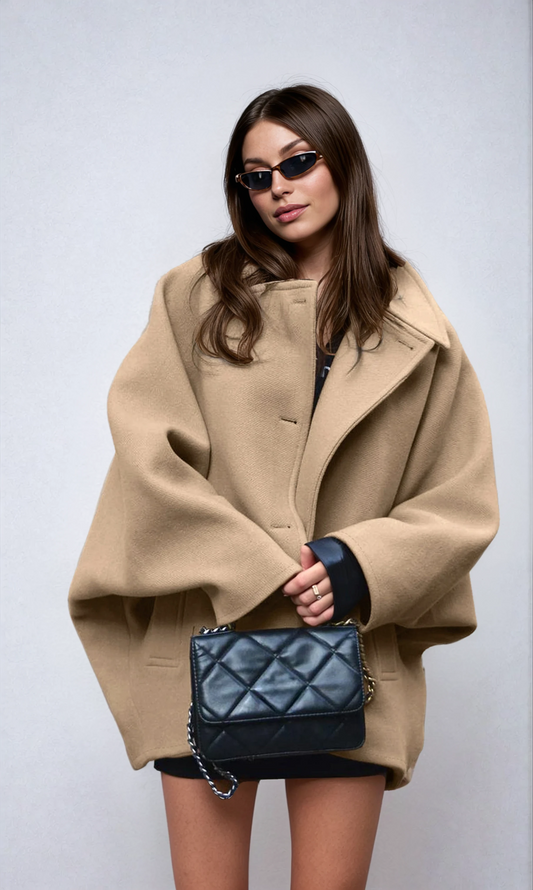 Beige oversized wool coat with notched collar and button placket