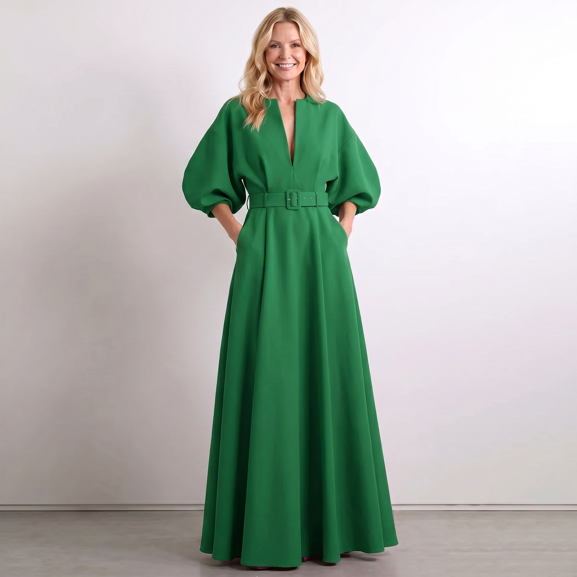 Green A-line maxi dress with short puff sleeves, V-neck, and belted waist