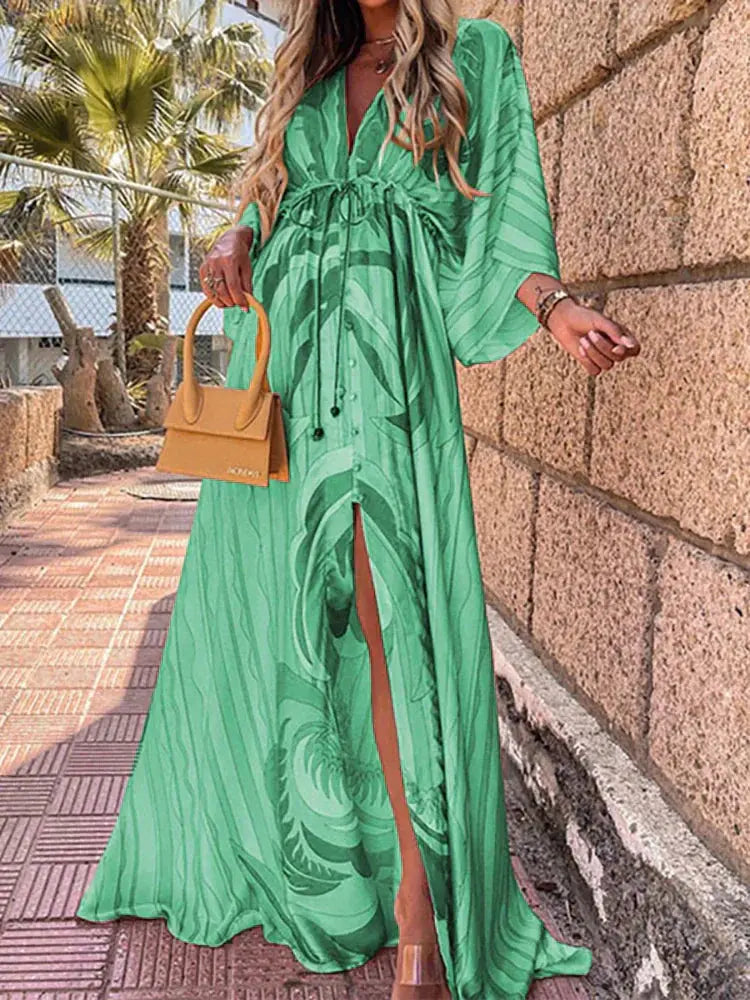 Green abstract print maxi dress with kimono sleeves and gathered waist, flowing hem
