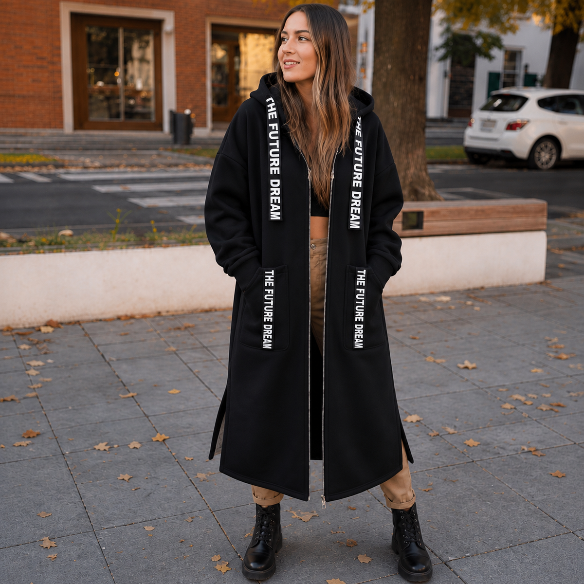 Black longline hooded coat with alphabet patchwork text trim on sleeves