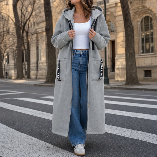 Long gray zip-up hooded jacket with front pockets and printed strap detailing on pockets