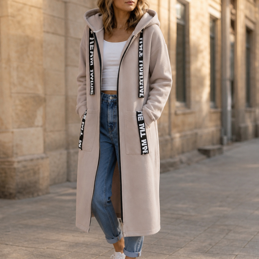 Taupe zip-up hooded jacket with black letter tape along zipper and pockets
