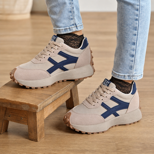 Beige and navy anti-slip platform sneakers, lace-up with chunky tread sole.
