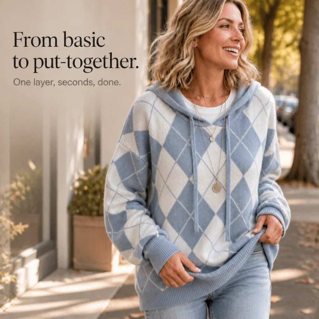 Blue and cream argyle hooded sweater with ribbed hem and relaxed sleeves.