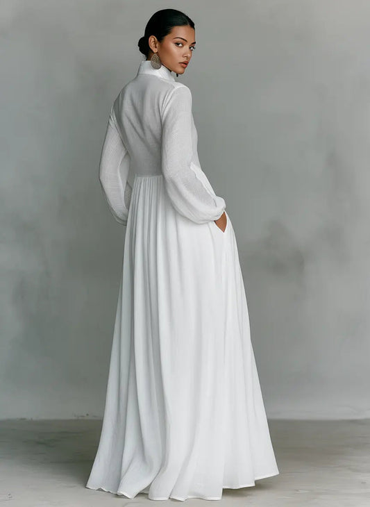 Light gray maxi dress with long sleeves and v-neck, side profile