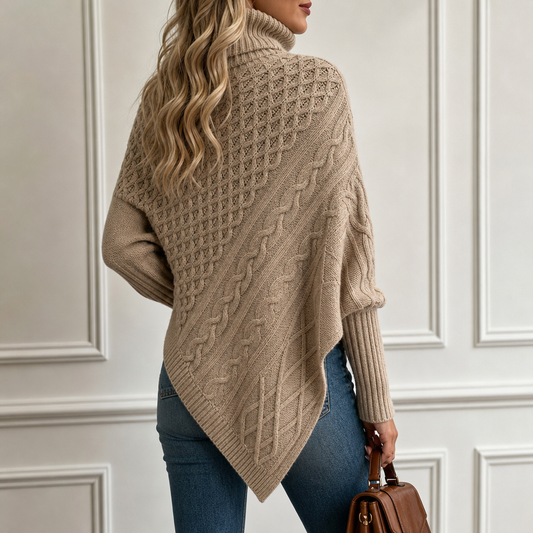Taupe cable-knit turtleneck poncho with diagonal cable pattern and draped asymmetrical hem