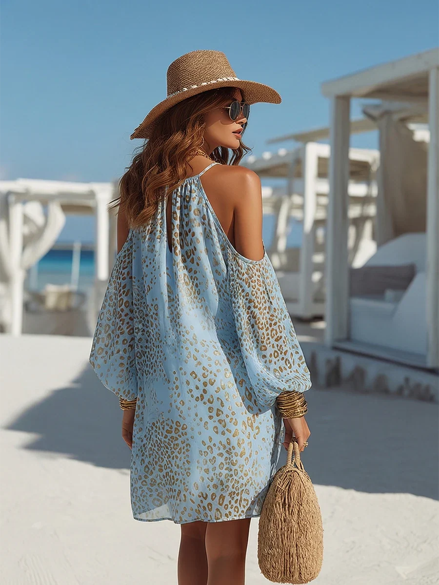 Blue leopard-print cold-shoulder mini dress with balloon sleeves, open-shoulder back view