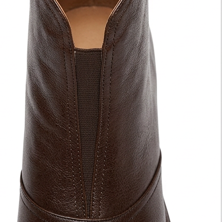 Brown ankle boot shaft with V-seam detail and pull-on opening