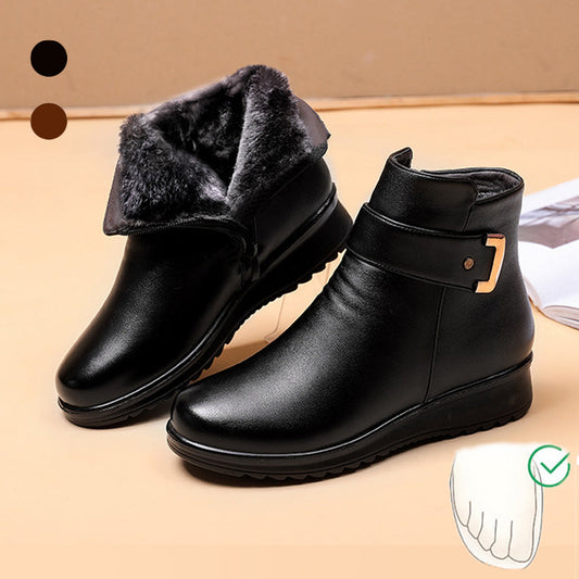 Black buckle ankle boots with faux-fur cuff and side buckle detail