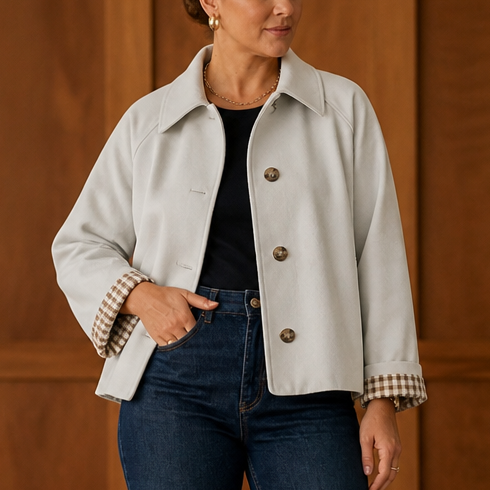 Light beige raglan casual coat with button front, turn-back collar, checked lining cuffs