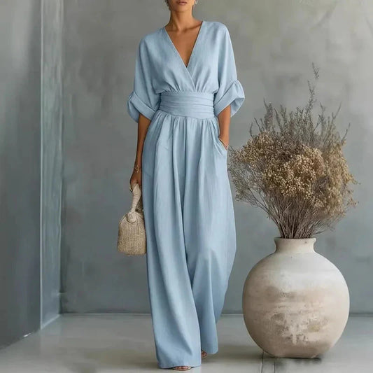 Sky blue chiffon wide-leg jumpsuit with V-neck, short sleeves and elastic waist