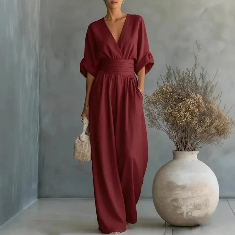 Wine red chiffon wide-leg jumpsuit with V-neck, short sleeves and elastic waist