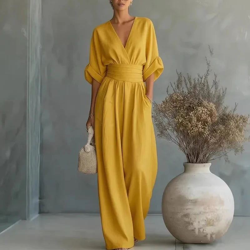 Yellow chiffon wide-leg jumpsuit with V-neck, short sleeves and elastic waist