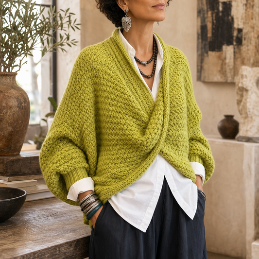 Chunky green knit crossover V-neck sweater with dropped shoulders and ribbed cuffs