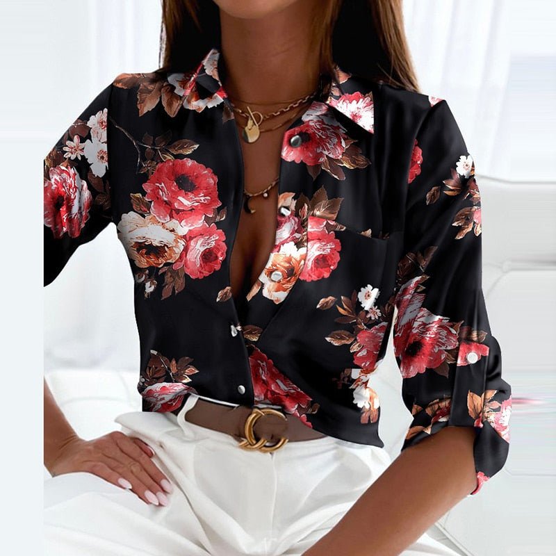Black floral-print button-up blouse with open collar and front buttons