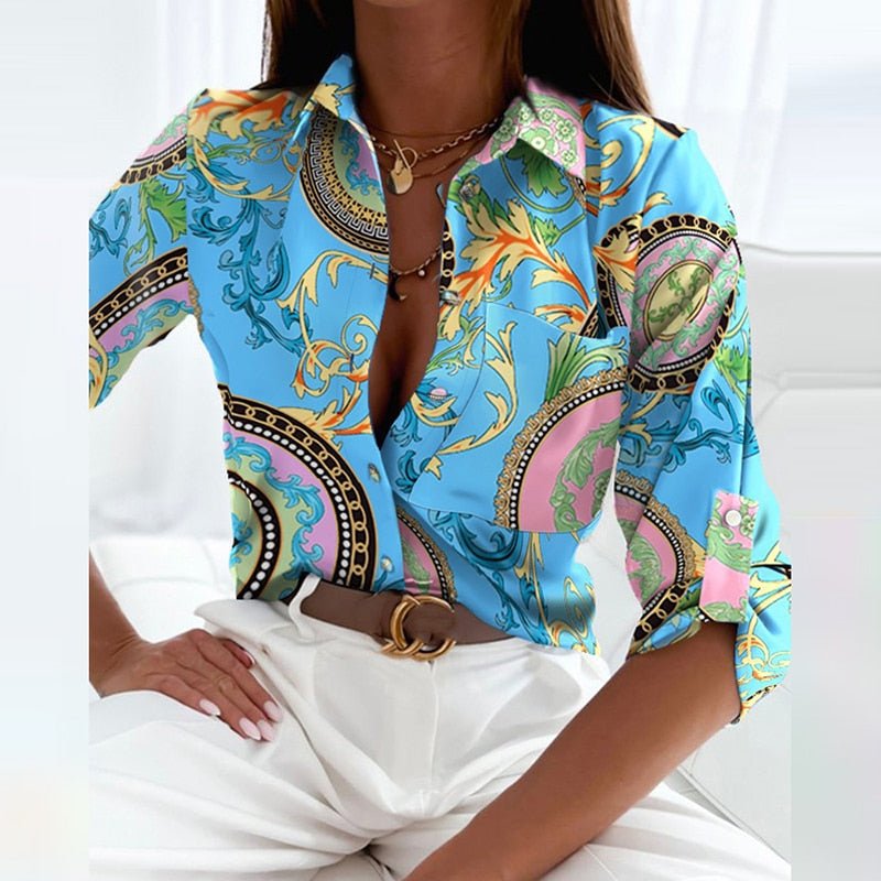 Blue paisley-print button-up blouse with open collar and front buttons