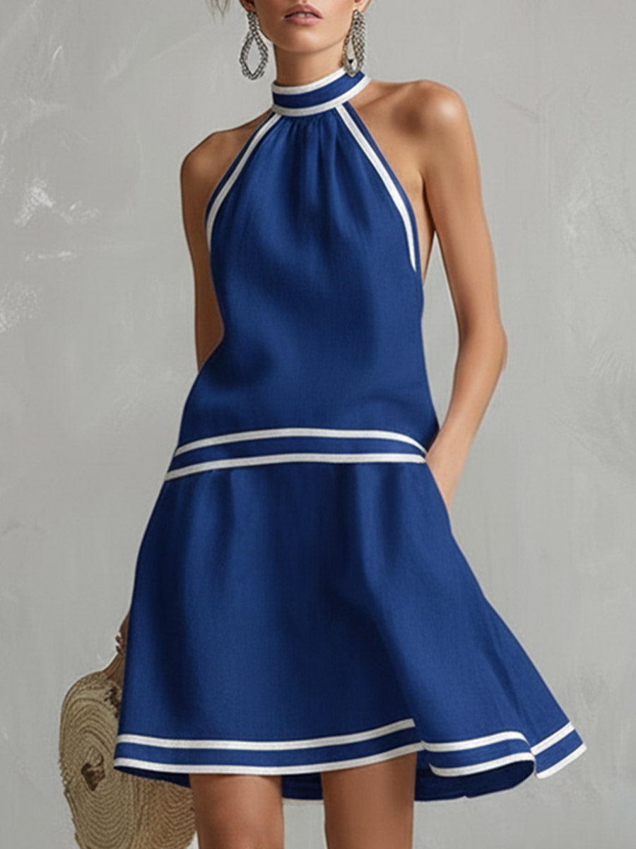 Blue halter mini dress with white-and-navy contrast stripes, cotton-linen blend
