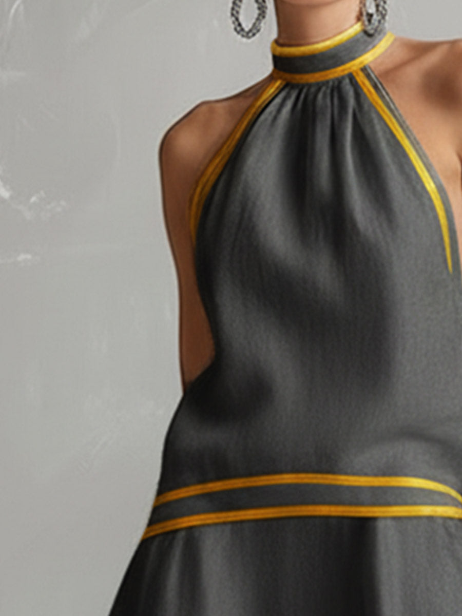 Dark grey halter mini dress close-up with yellow contrast stripes, cotton-linen blend