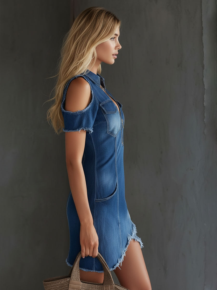 Blue denim mini dress, sleeveless with shoulder cutouts and zip front, frayed hem