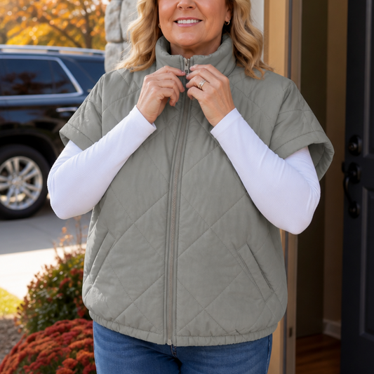 Grey diamond-quilted vest with full-zip front and stand collar