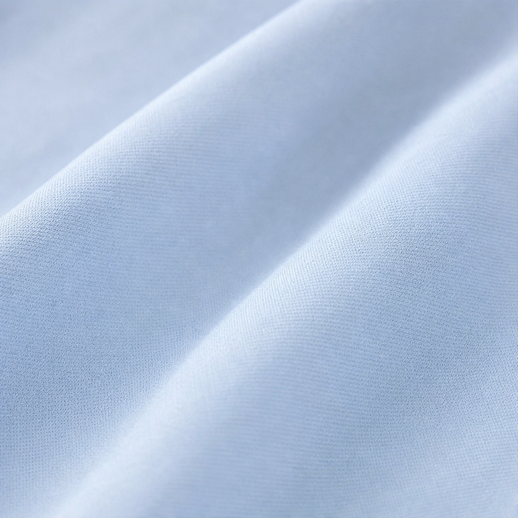 Light blue suiting fabric swatch with smooth woven texture