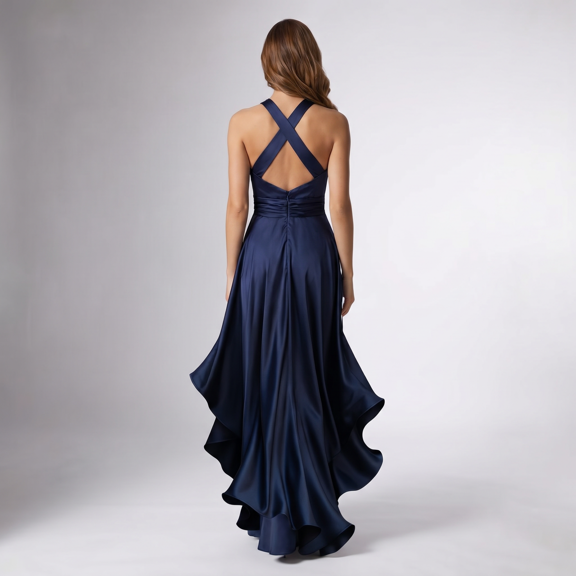 Navy blue halter wrap gown back view with crisscross straps and layered long skirt