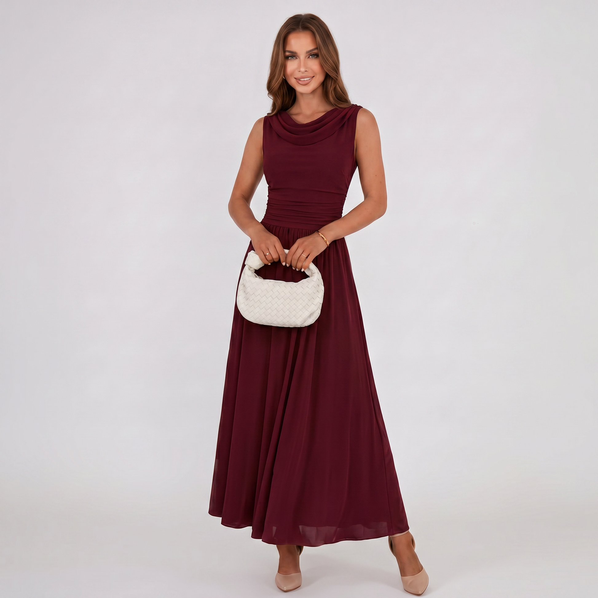 Burgundy sleeveless draped-neck midi dress with pleated waist and flowing skirt