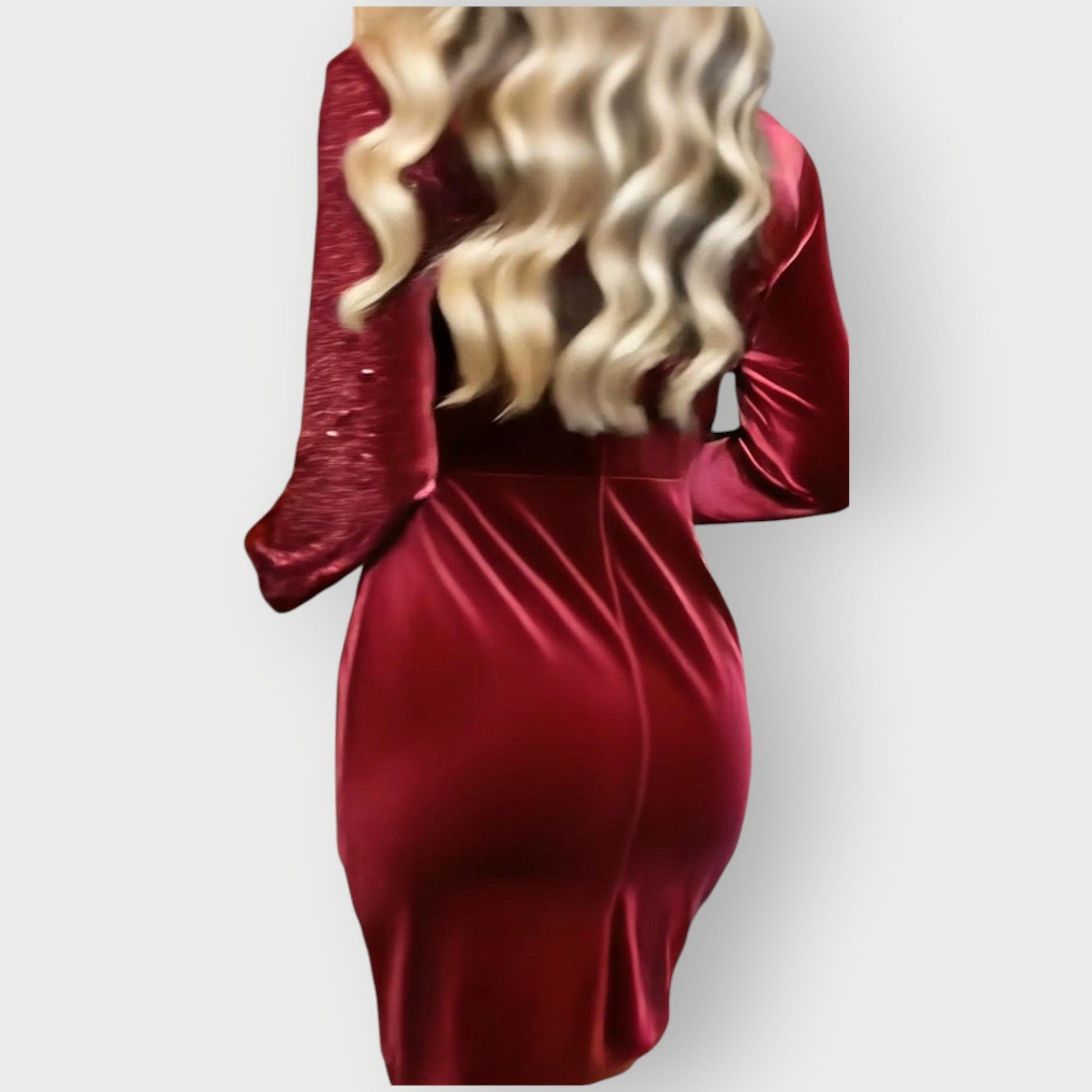 Burgundy satin bodycon dress with V-neck, long sleeves, ruched waist, asym hem.