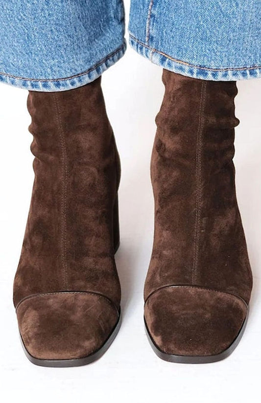 Dark brown suede ankle boots with block heel and rounded toe, seam detail