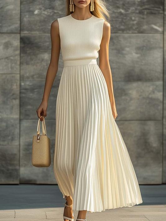 Cream chiffon maxi dress with sleeveless ribbed bodice and pleated skirt