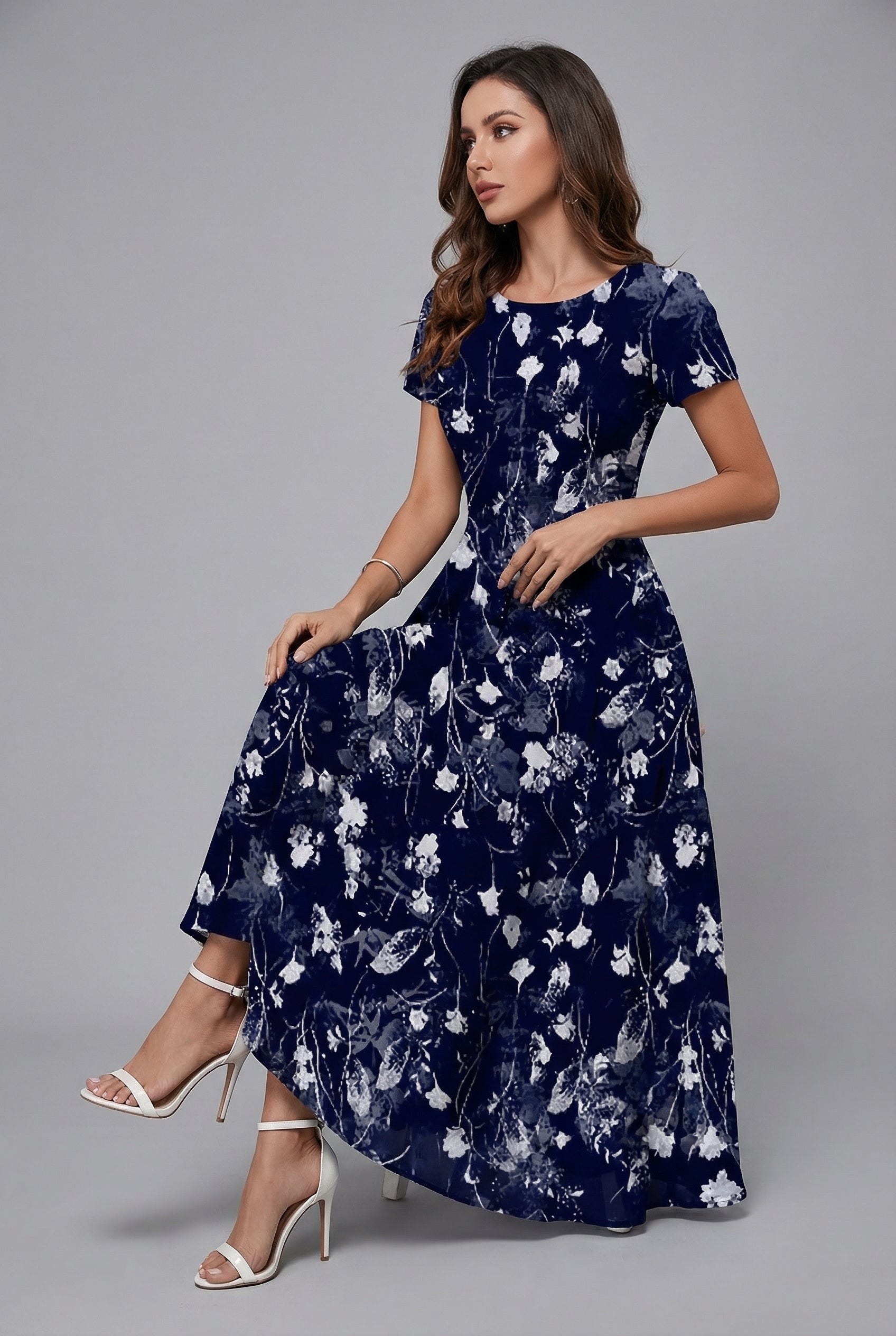 Navy floral midi dress with crew neck and short sleeves, side profile flared skirt