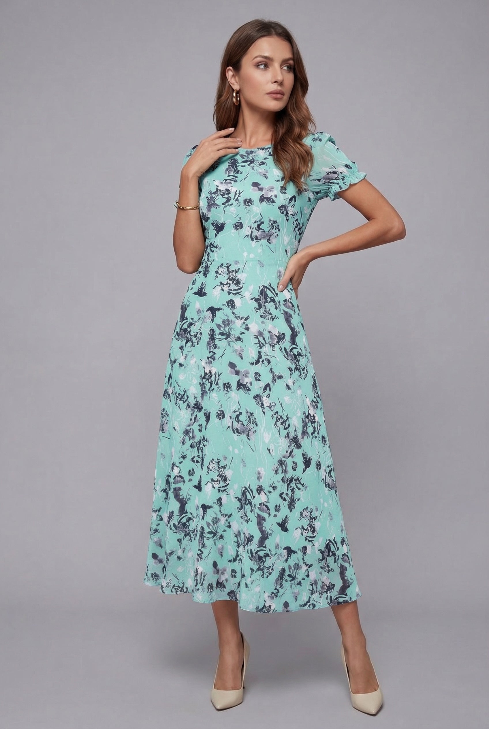 Cyan floral midi dress with crew neck and short sleeves, fitted waist and flared skirt