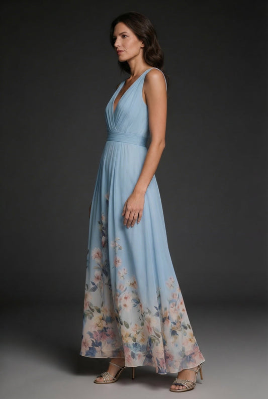 Light blue floral V-neck maxi dress with gathered waist and flowing full skirt, side view