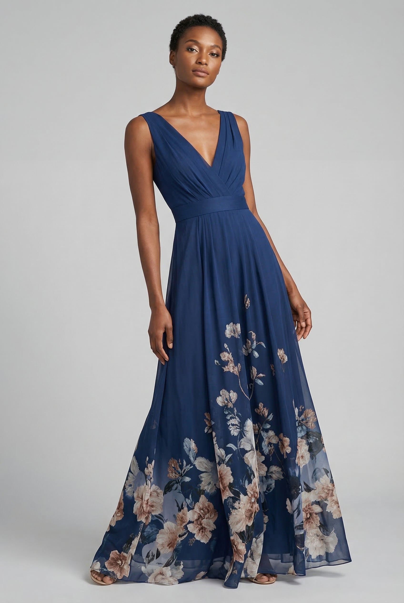Navy blue floral V-neck maxi dress, sleeveless with cinched waist and full A-line skirt