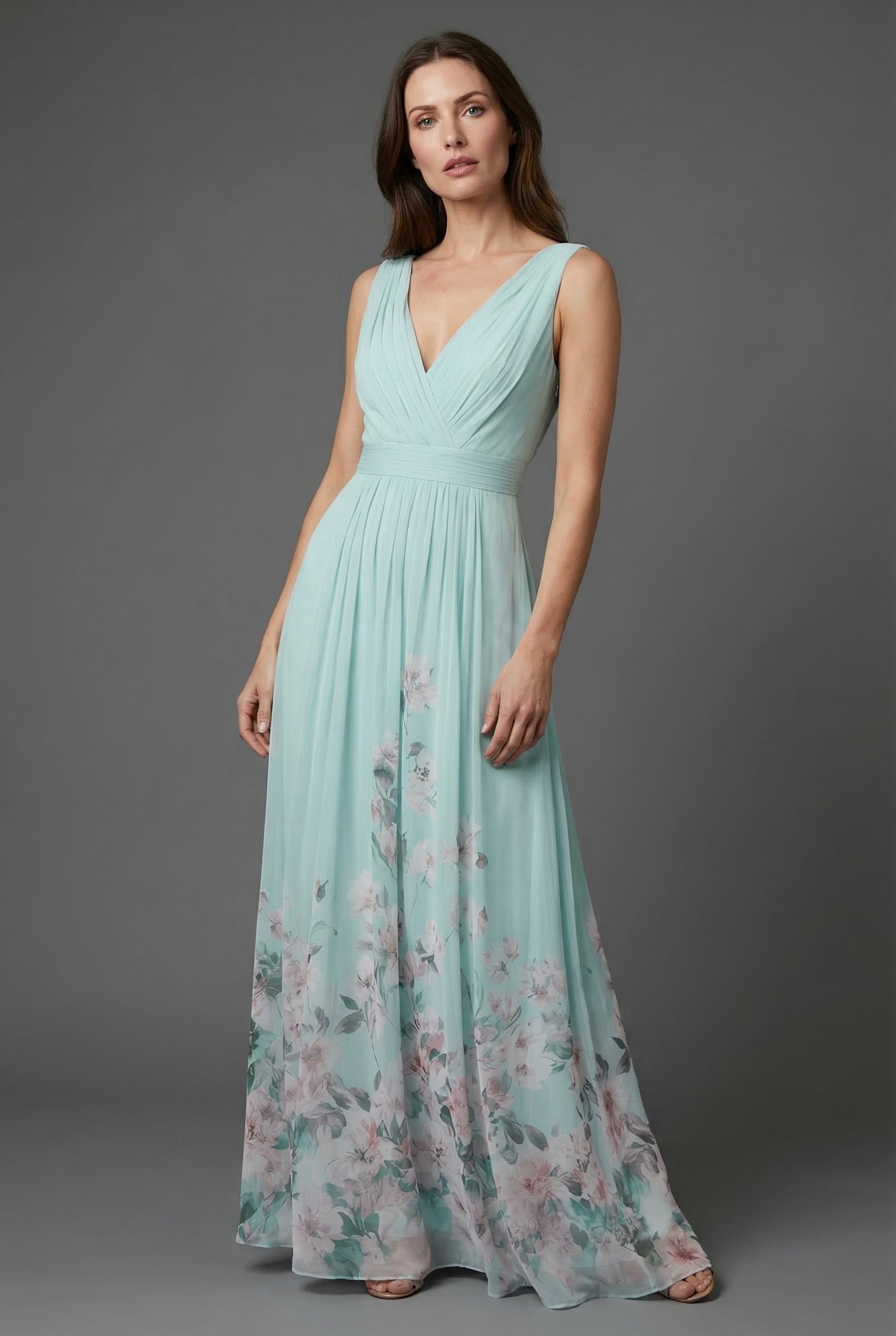 Light green floral V-neck maxi dress, sleeveless with fitted waist and flowing skirt