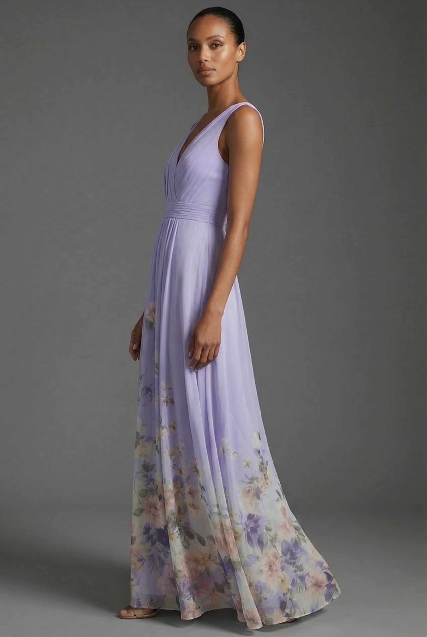 Purple floral V-neck maxi dress, sleeveless with cinched waist and full skirt, side view