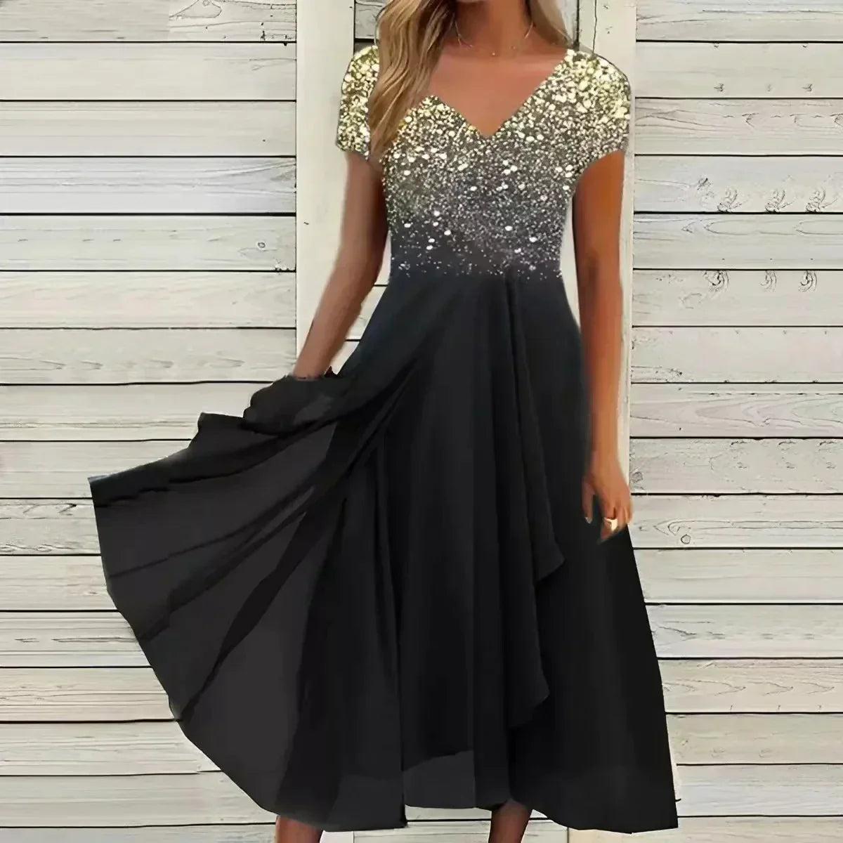 V-neck midi dress with gold sequin bodice and black tiered skirt