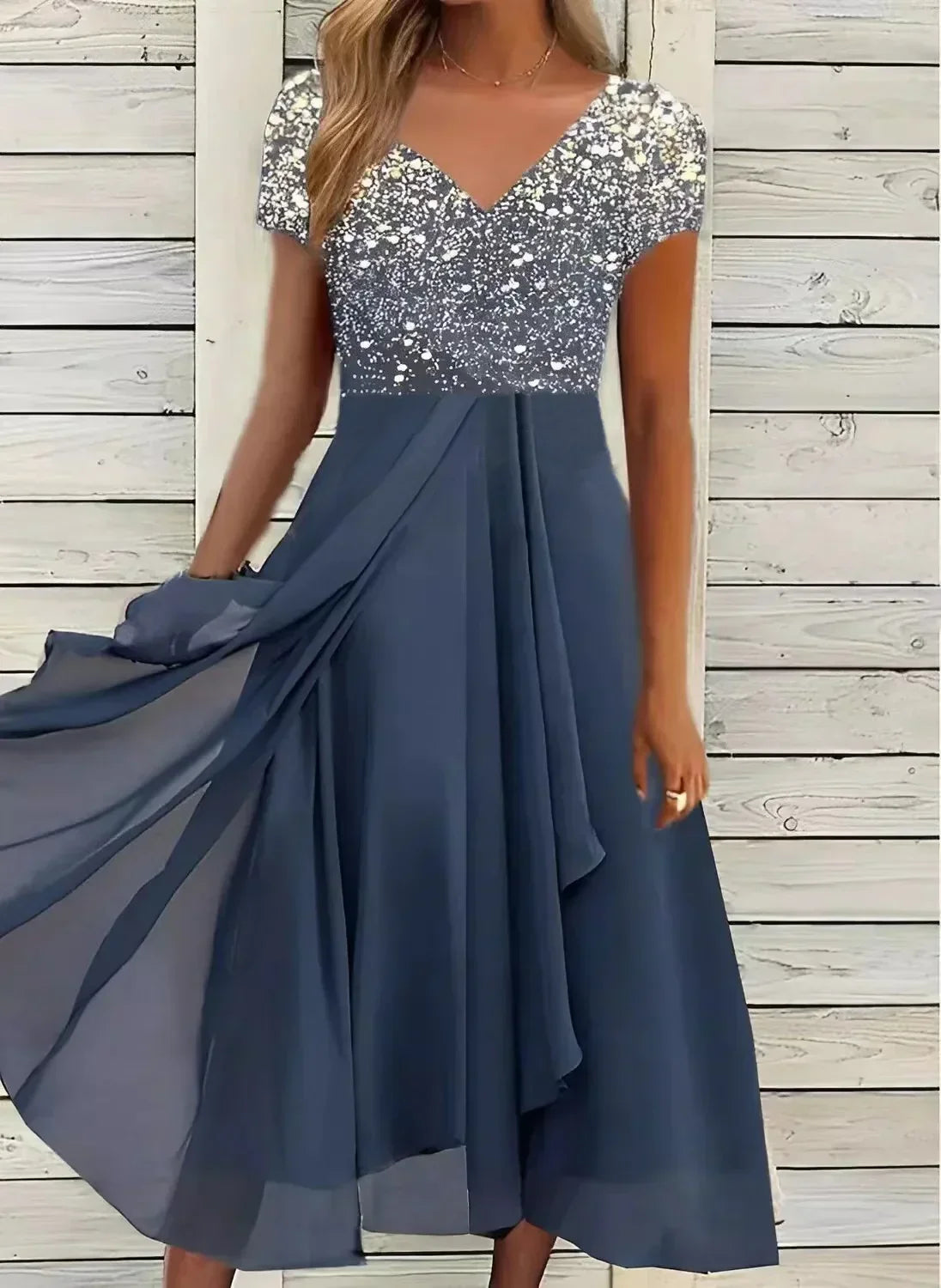 V-neck midi dress with silver sequin bodice and blue tiered skirt
