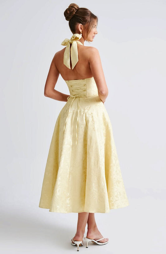 Ivory halter midi dress, open-back with bow detail and flared jacquard skirt