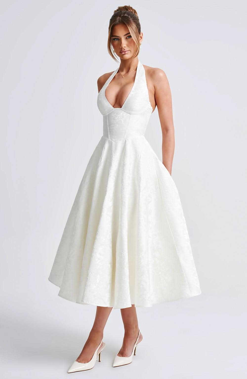 Ivory halter midi dress with floral jacquard, fitted bodice and full skirt