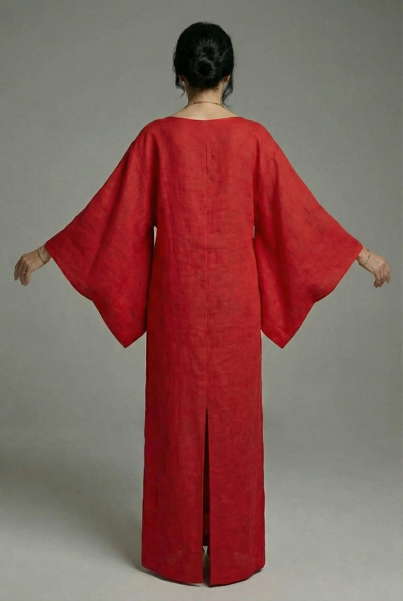 Red kimono midi dress back view with wide sleeves and long split hem.
